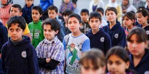 Caritas International België Scholen in Libanon en Jordanië kunnen de toevloed van Syrische vluchtelingen niet meer aan