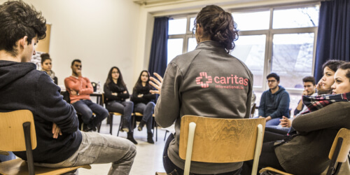 Caritas International België Workshop in de klas – Between 2 worlds