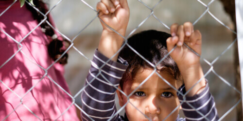 Caritas International België In januari 2018 zal ons land opnieuw onschuldige kinderen opsluiten