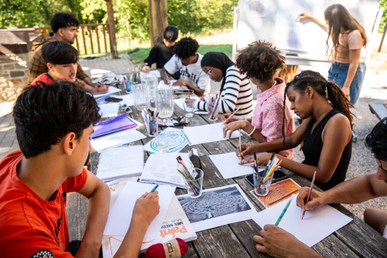 Caritas International Belgium In Bomal, young people in exile find the space to be teenagers again
